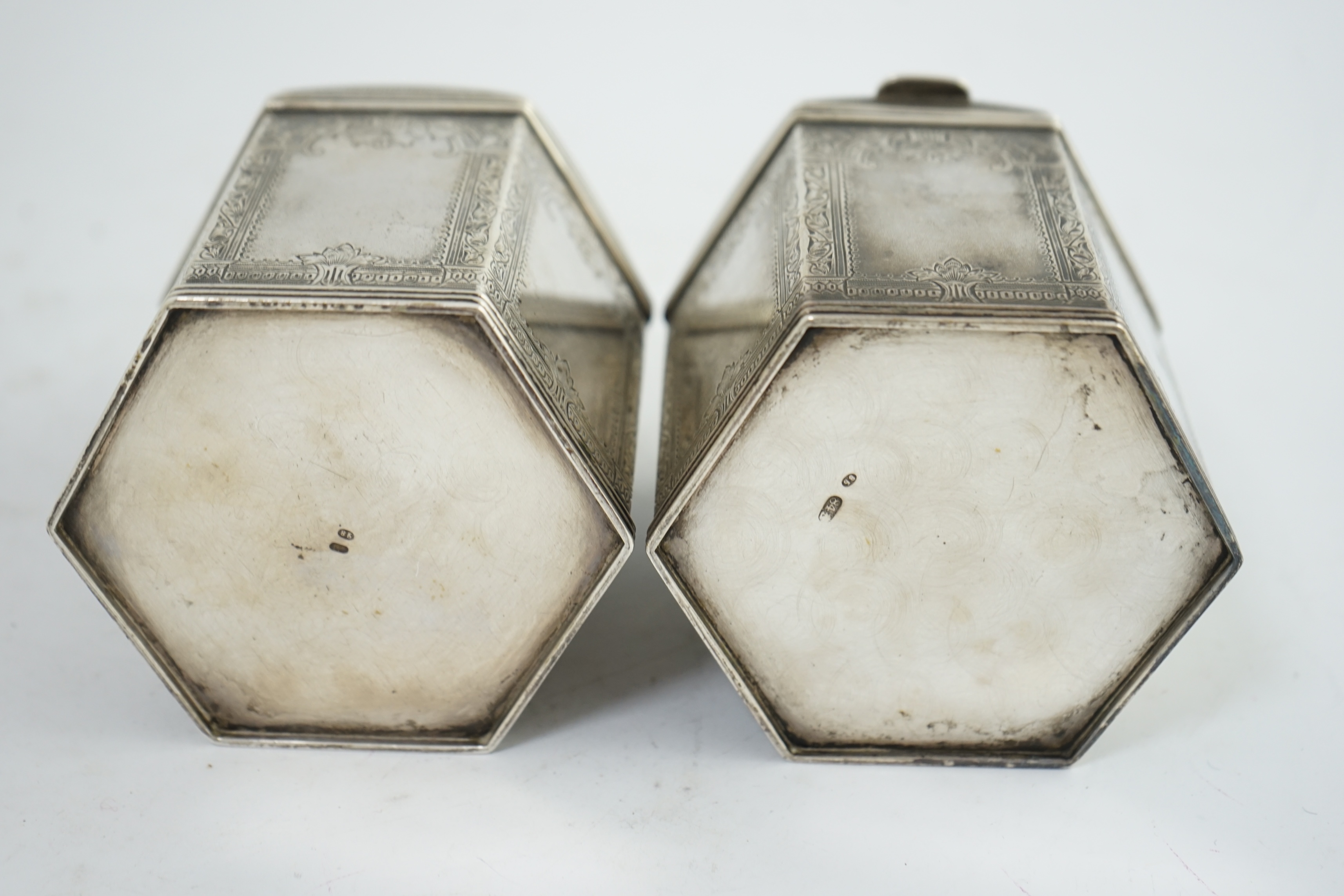 Two similar late 19th/early 20th century Russian 84 zolotnik silver tea caddies, master Varvara Baladanov